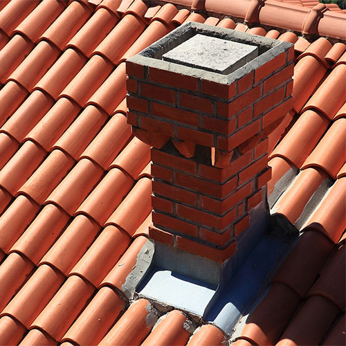 Chim Chimney Sweep Stock Image of Damaged Chimney arial view of custom brick chimney with damaged masonry