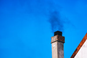 chimney with smoke coming out