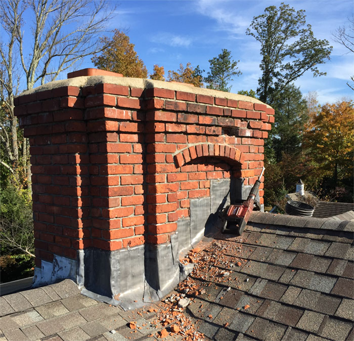 Technician Inspecting Fireplace