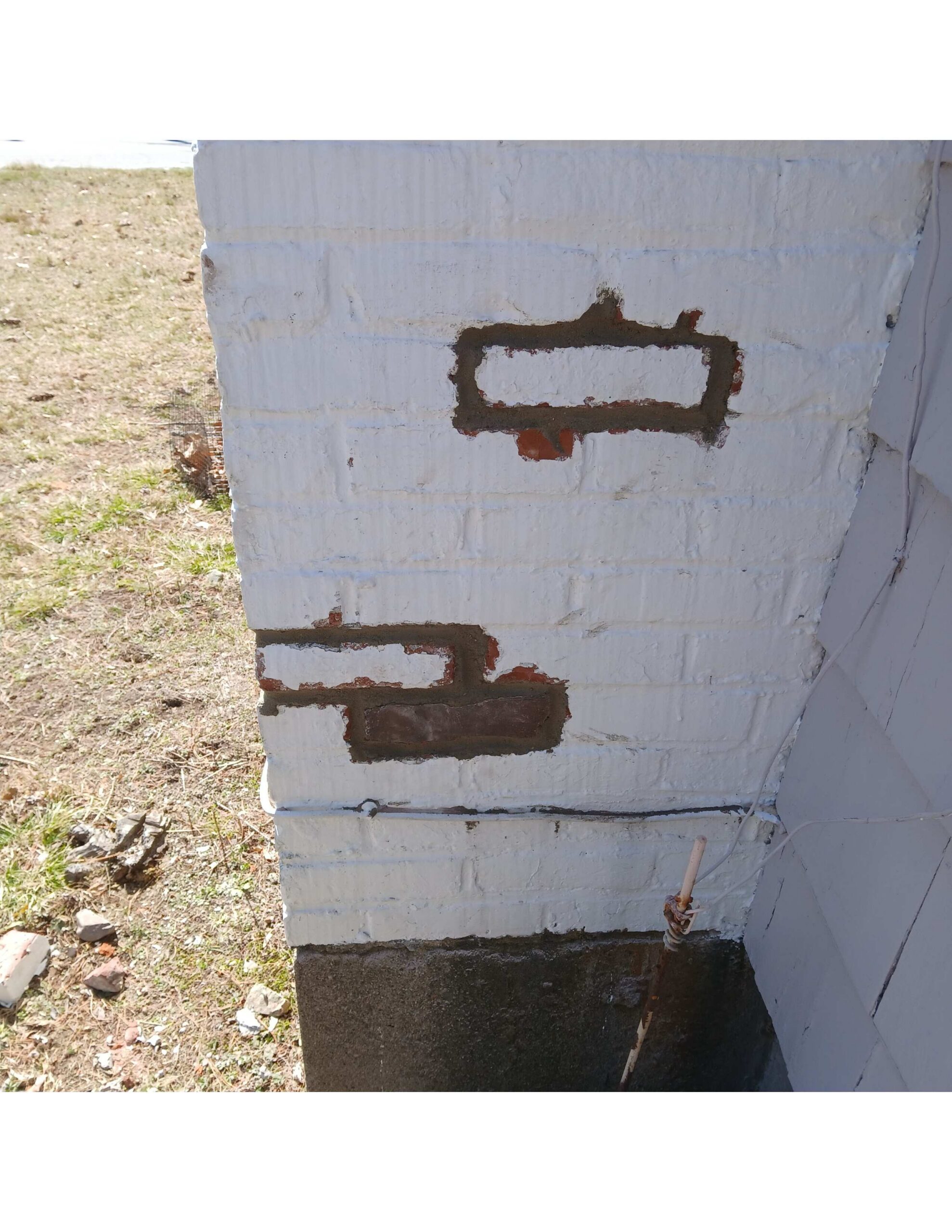 Original image of a chimney repaired after raccoons had entered.
